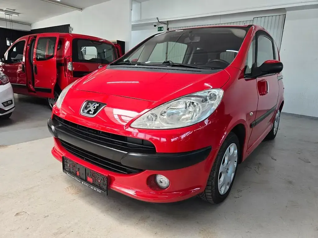 Gebraucht Peugeot 1007 Premium 73 PS (53 kW) 2006 Rot Van / Kleinbus