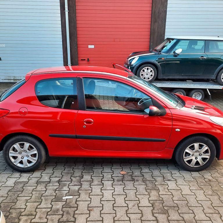Gebraucht Peugeot 206+ 68 PS (50 kW) 2011 Rot Kleinwagen