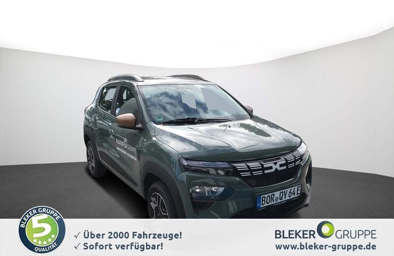 Grün Gebraucht 2023 Dacia Spring Extreme Kleinwagen | 16.890 € (Etwas zu teuer) - Bild 1/4
