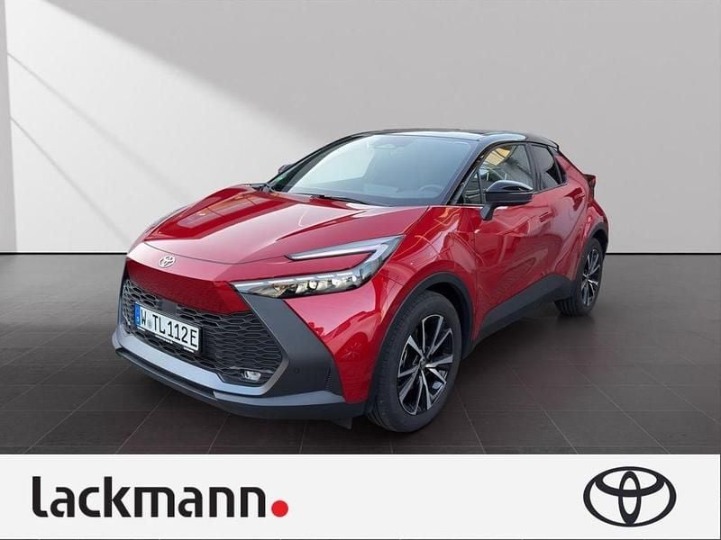 Emotional red 2 (3u5)/ black ( Gebraucht 2024 Toyota C-HR Team SUV | 35.880 € (Fairer Preis) - Bild 1/4