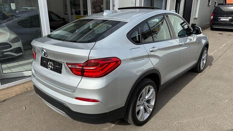 Gebraucht BMW X4 Sport Line 313 PS (230 kW) 2015 Glaciersilber metallic SUV