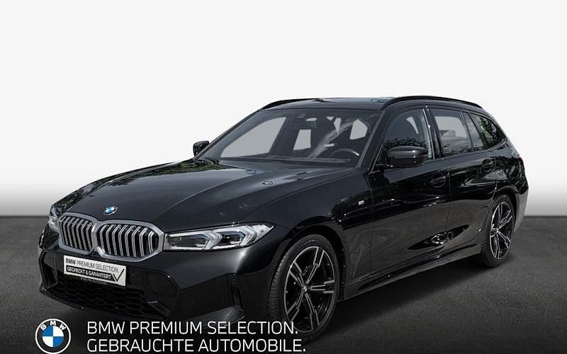 Saphirschwarz metallic Gebraucht 2023 BMW 318 Performance Kombi | 42.990 € - Bild 1/4