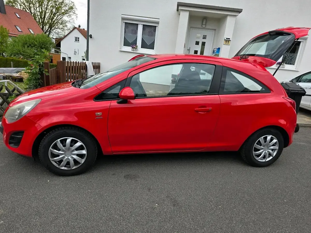 Używany Opel Corsa 101 KM (74 kW) 2013 Czerwony Hatchback
