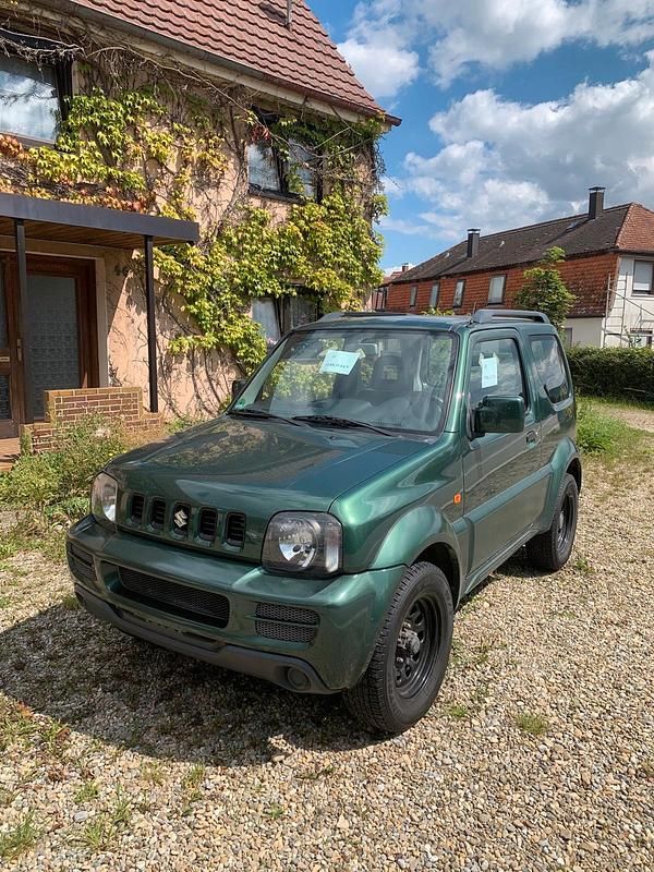 Grün Gebraucht 2009 Suzuki Jimny SUV | 3.250 € (Superpreis) - Bild 1/2