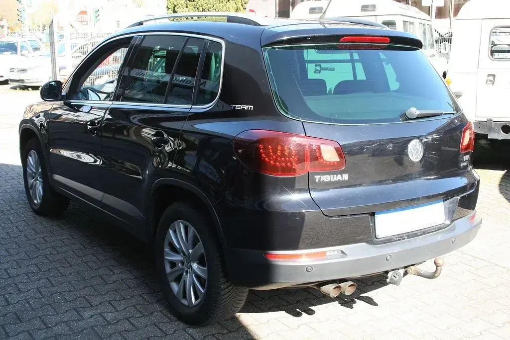 Gebraucht VW Tiguan Team 122 PS (89 kW) 2011 Schwarz SUV