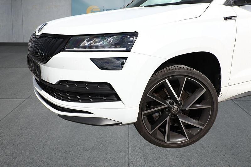 Weiß Gebraucht 2021 Skoda Karoq SUV | 24.299 € (Fairer Preis) - Bild 1/4