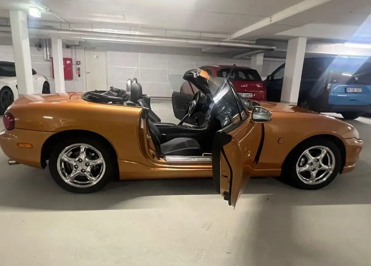 Gebraucht Mazda MX5 110 PS (80 kW) 1998 Orange Cabrio