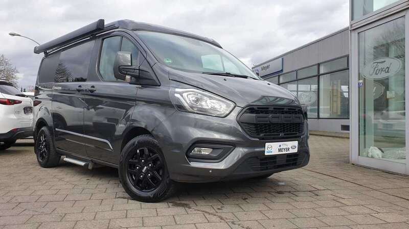 Grau Gebraucht 2023 Ford Tourneo Custom Van | 61.890 € - Bild 1/4