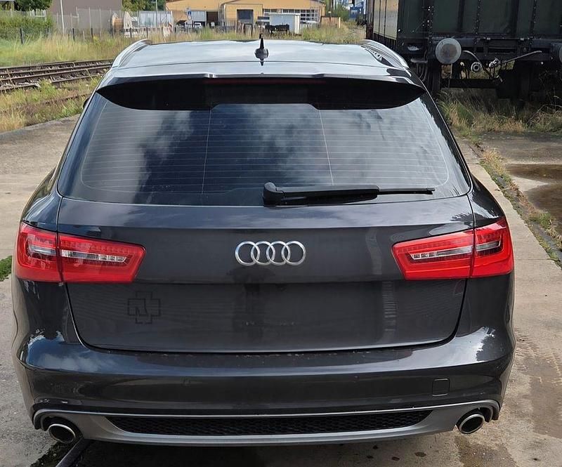 Schwarz Gebraucht 2014 Audi A6 Ambiente Kombi | 11.799 € (Fairer Preis) - Bild 1/4