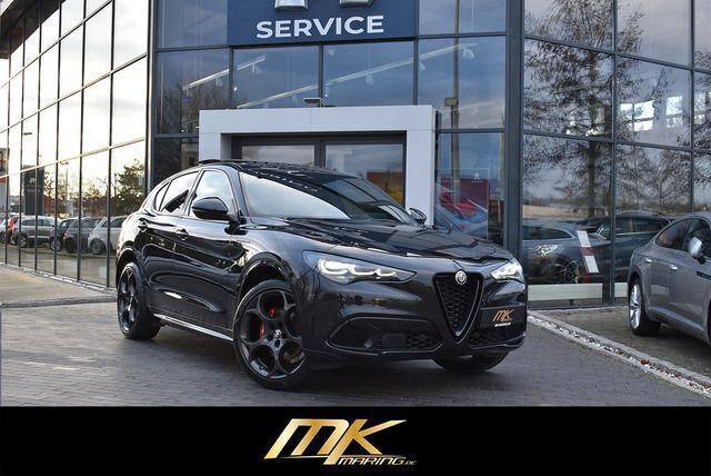 Nero vulcano, metallic Gebraucht 2023 Alfa Romeo Stelvio Competizione SUV | 47.990 € (Teuer) - Bild 1/4