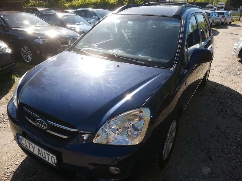 Blau Gebraucht 2009 Kia Carens EX Van / Kleinbus | 4.470 € - Bild 1/4