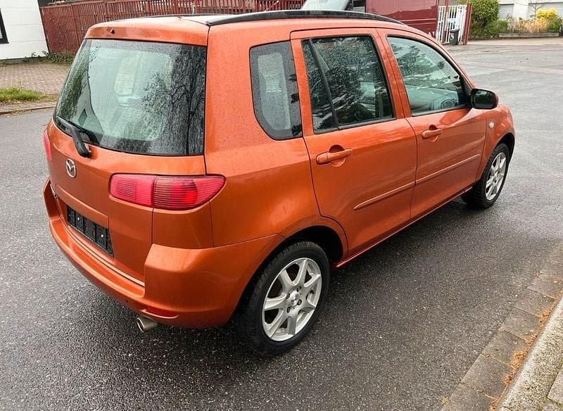 Second-hand Mazda 2 80 CP (58 kW) 2003 Portocaliu Hatchback