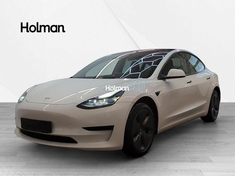 Weiß Gebraucht 2021 Tesla Model 3 Standard Range Plus Limousine | 24.145 € (Guter Preis) - Bild 1/4