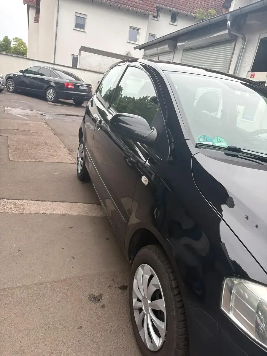 Gebraucht VW Fox 77 PS (56 kW) 2008 Schwarz Kleinwagen