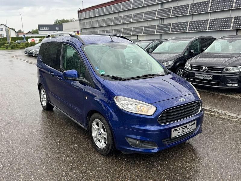 Blau Gebraucht 2014 Ford Tourneo Courier Trend Van / Kleinbus | 5.999 € (Fairer Preis) - Bild 1/4