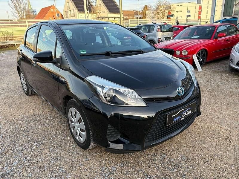 Black mica / ink Gebraucht 2012 Toyota Yaris Hybrid Life Kleinwagen | 8.800 € (Guter Preis) - Bild 1/4