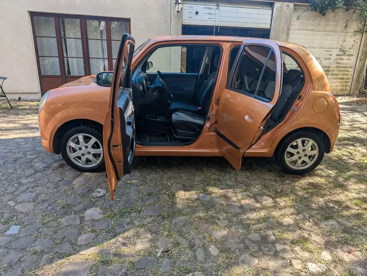 Gebraucht Daihatsu Trevis 58 PS (42 kW) 2006 Orange Kleinwagen