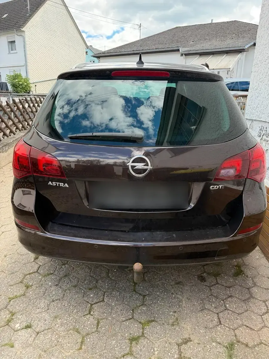 Gebraucht Opel Astra 110 PS (80 kW) 2011 Braun Kombi