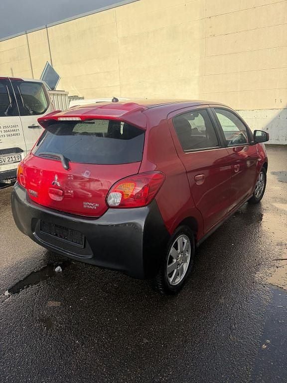 Gebraucht Mitsubishi Space Star 80 PS (58 kW) 2014 Rot Van / Kleinbus