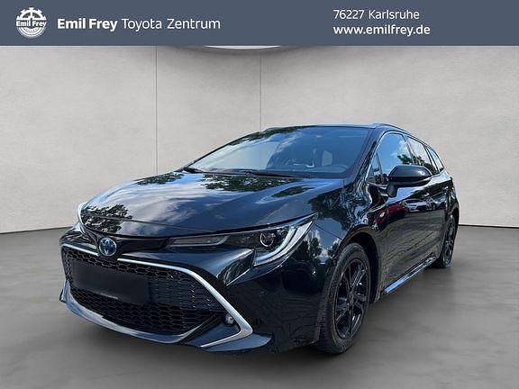 Mysticschwarz mica Gebraucht 2022 Toyota Corolla Lounge Kombi | 26.480 € (Fairer Preis) - Bild 1/4