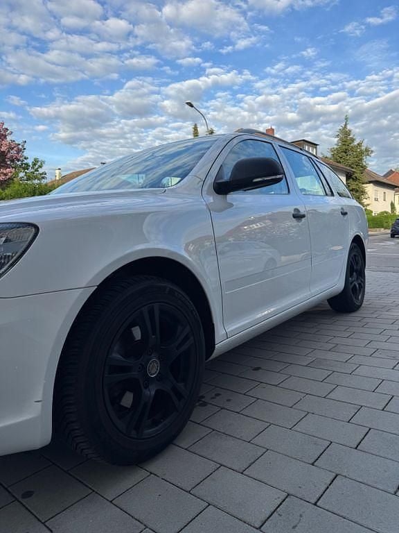 Second-hand Skoda Octavia Elegance 105 CP (77 kW) 2012 Alb Break