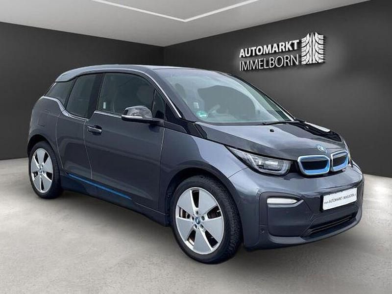 Mineralgrau met.bmw i (metallic) Gebraucht 2018 BMW i3 Comfort Edition Kleinwagen | 15.880 € (Fairer Preis) - Bild 1/4