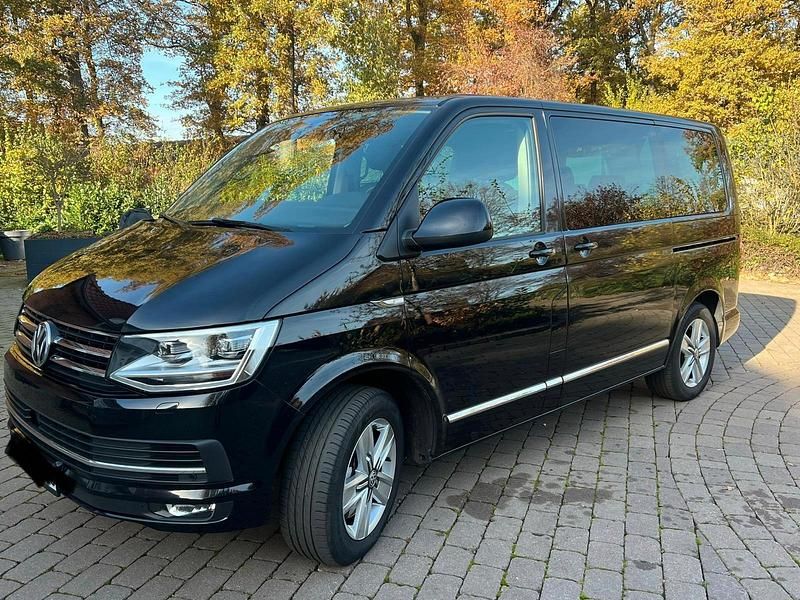 Schwarz Gebraucht 2018 VW Multivan Generation Six Van | 31.750 € (Fairer Preis) - Bild 1/4
