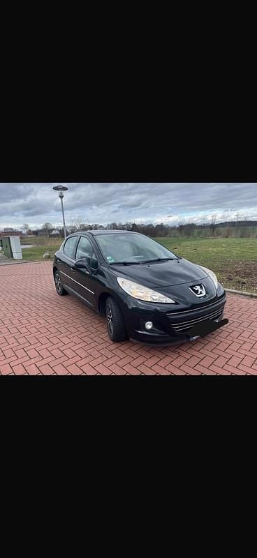 Gebraucht Peugeot 207 95 PS (69 kW) 2011 Schwarz Kleinwagen