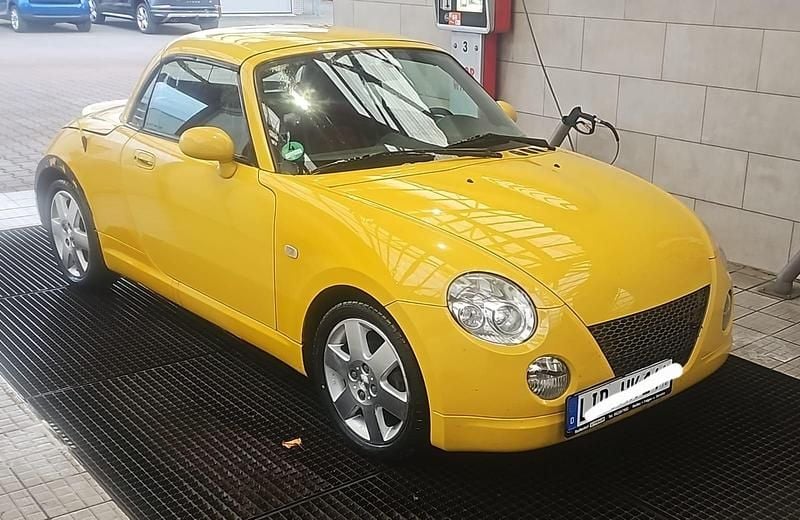 Gelb Gebraucht 2006 Daihatsu Copen Cabrio | 2.999 € - Bild 1/4