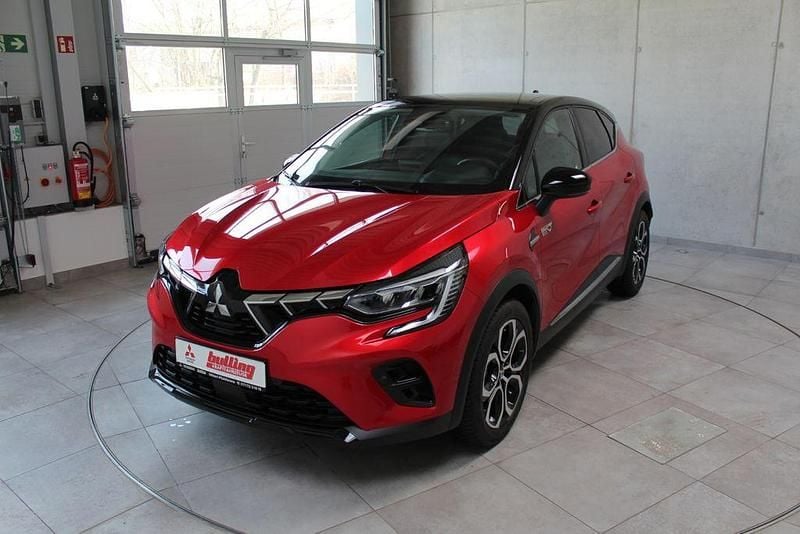 Gebraucht Mitsubishi ASX Top 143 PS (105 kW) 2023 Aurorarot/onyxschwarz SUV