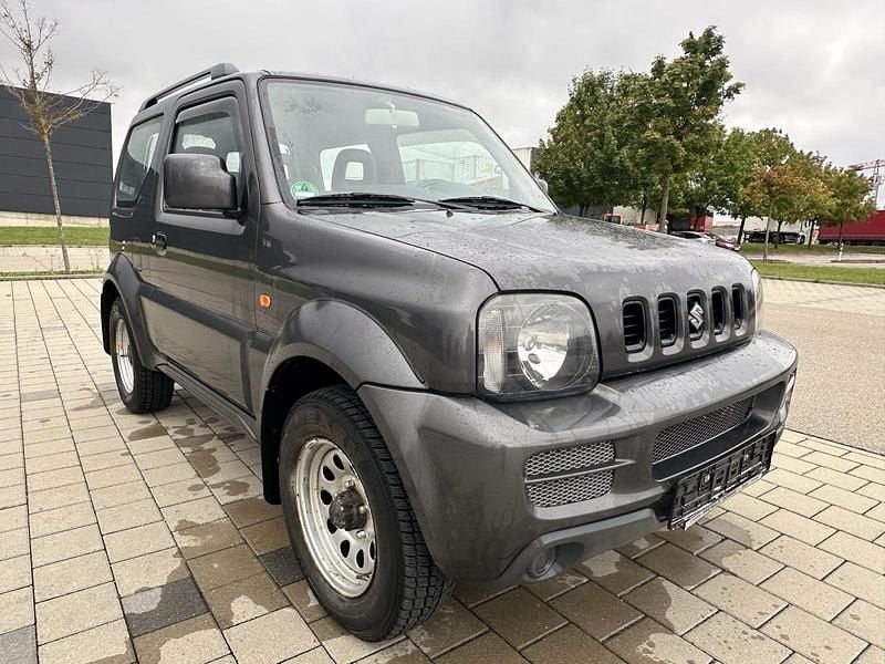 Grau Gebraucht 2009 Suzuki Jimny Ranger SUV | 6.999 € (Fairer Preis) - Bild 1/4