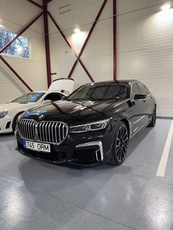 Schwarz Gebraucht 2020 BMW 745e M Sport Limousine | 55.000 € (Teuer) - Bild 1/4
