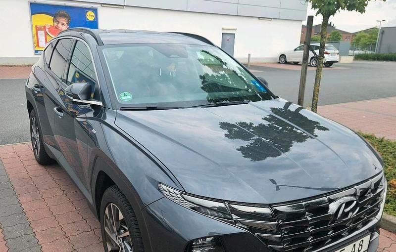 Grau Gebraucht 2023 Hyundai Tucson SUV | 24.700 € (Superpreis) - Bild 1/2