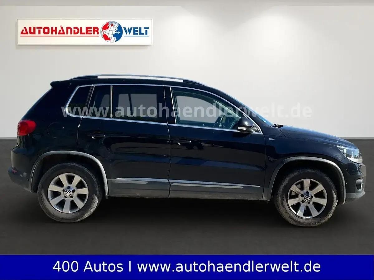 Second-hand VW Tiguan Trendline 140 CP (102 kW) 2014 Negru SUV