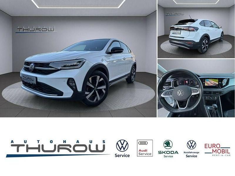 Pure white/deep black perleffekt Gebraucht 2022 VW Taigo Style SUV | 19.600 € (Fairer Preis) - Bild 1/4