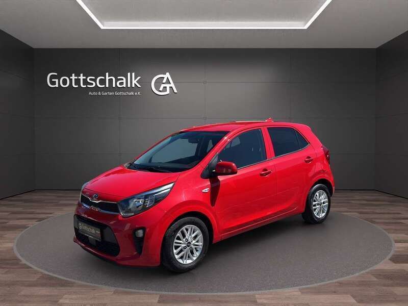 Shiny red metallic (metallic) Gebraucht 2021 Kia Picanto DREAM-TEAM Edition Kleinwagen | 11.890 € (Fairer Preis) - Bild 1/4