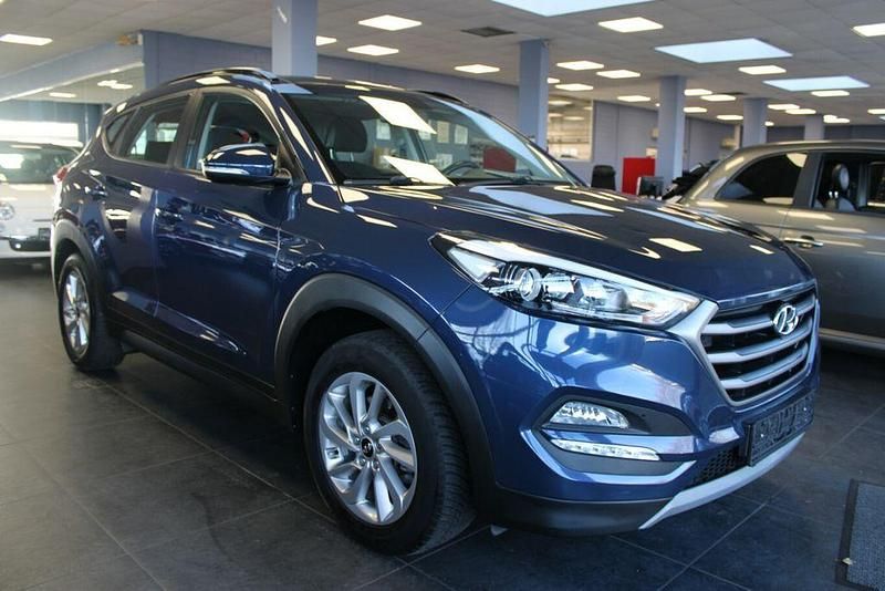 Blau Gebraucht 2017 Hyundai Tucson SUV | 15.980 € (Fairer Preis) - Bild 1/4