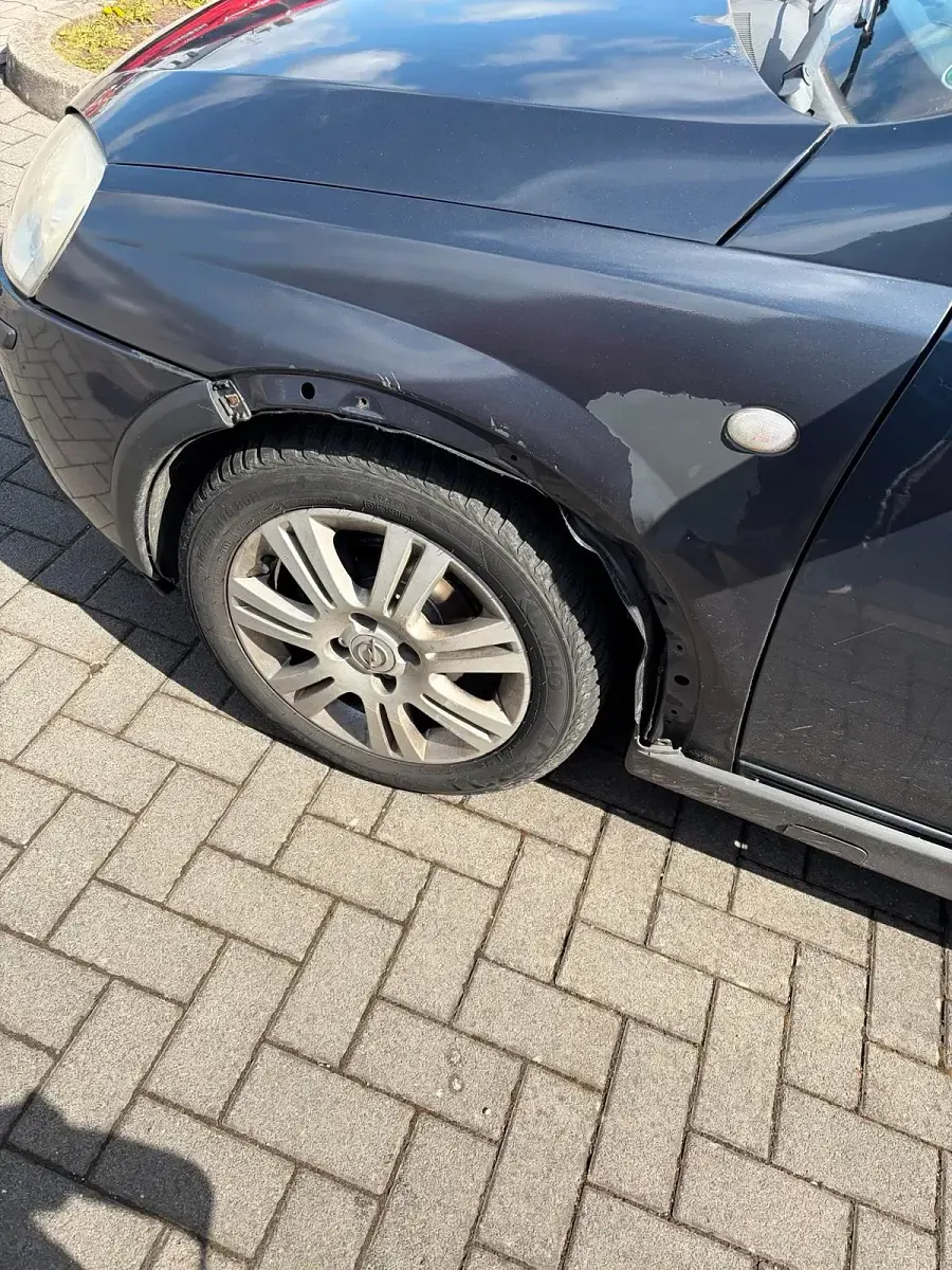 Używany Opel Corsa 76 KM (55 kW) 2006 Szary Hatchback
