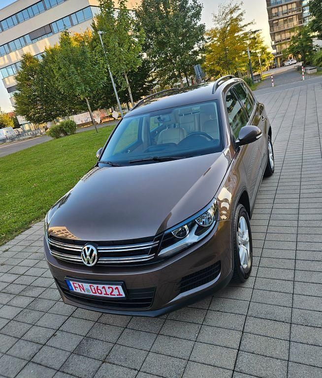 Braun Gebraucht 2012 VW Tiguan Trendline SUV | 12.900 € (Fairer Preis) - Bild 1/4
