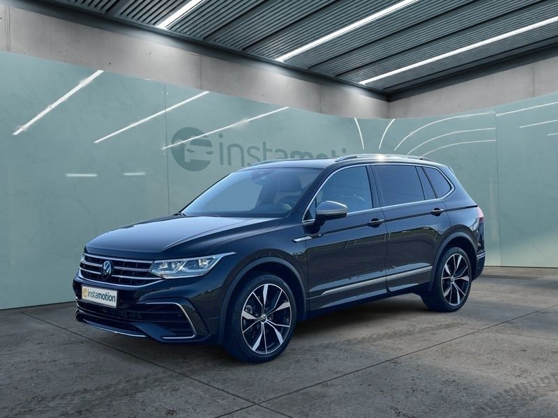 Schwarz Gebraucht 2024 VW Tiguan Allspace R-line SUV | 47.091 € (Fairer Preis) - Bild 1/4