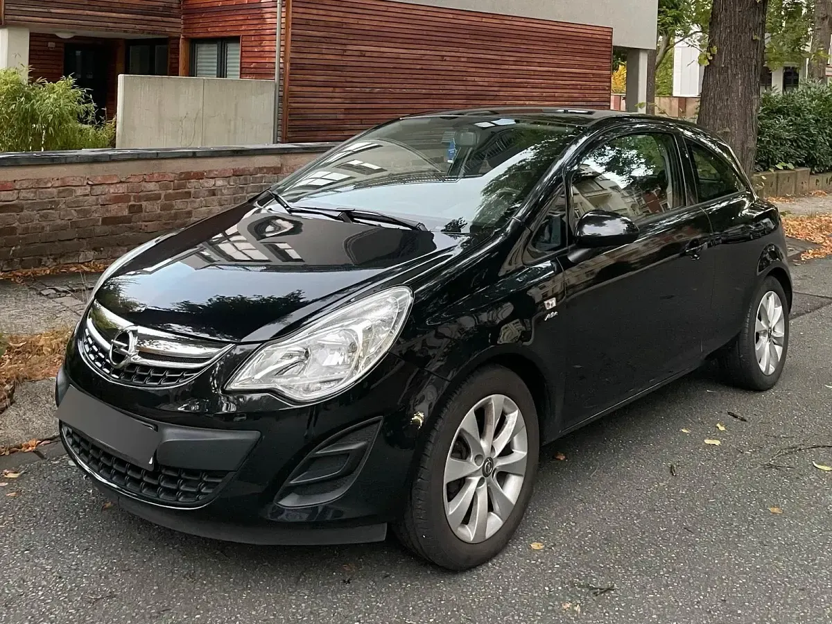 Gebraucht Opel Corsa Active 69 PS (50 kW) 2013 Schwarz Kleinwagen