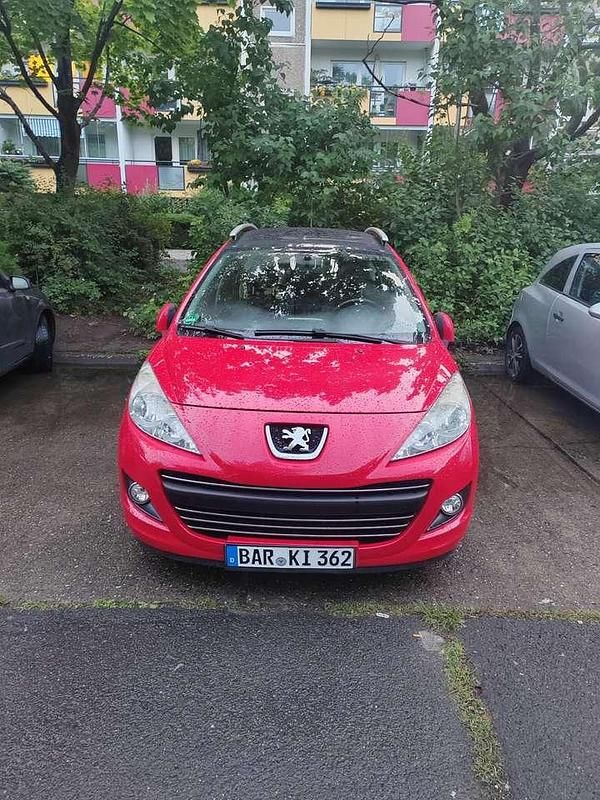 Rot Gebraucht 2012 Peugeot 207 Premium Kombi | 2.980 € (Fairer Preis) - Bild 1/4
