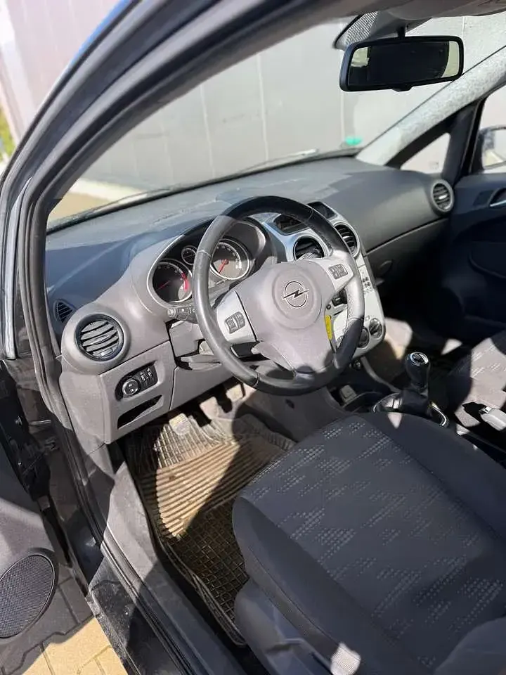 Gebraucht Opel Corsa 87 PS (63 kW) 2011 Schwarz Kleinwagen