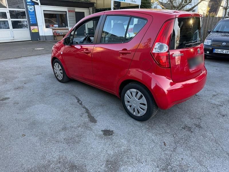 Usado Suzuki Splash Basic 65 HP (47 kW) 2010 Vermelho Citadino