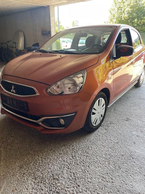Orange Gebraucht 2016 Mitsubishi Space Star Diamant Edition Kleinwagen | 4.999 € (Fairer Preis) - Bild 1/4