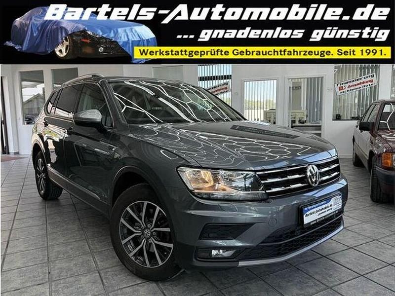 Platinum grey metallic Gebraucht 2018 VW Tiguan Allspace Comfortline SUV | 19.950 € (Fairer Preis) - Bild 1/4