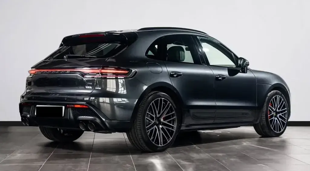 Gebraucht Porsche Macan 441 PS (324 kW) 2024 Vulkangrau SUV