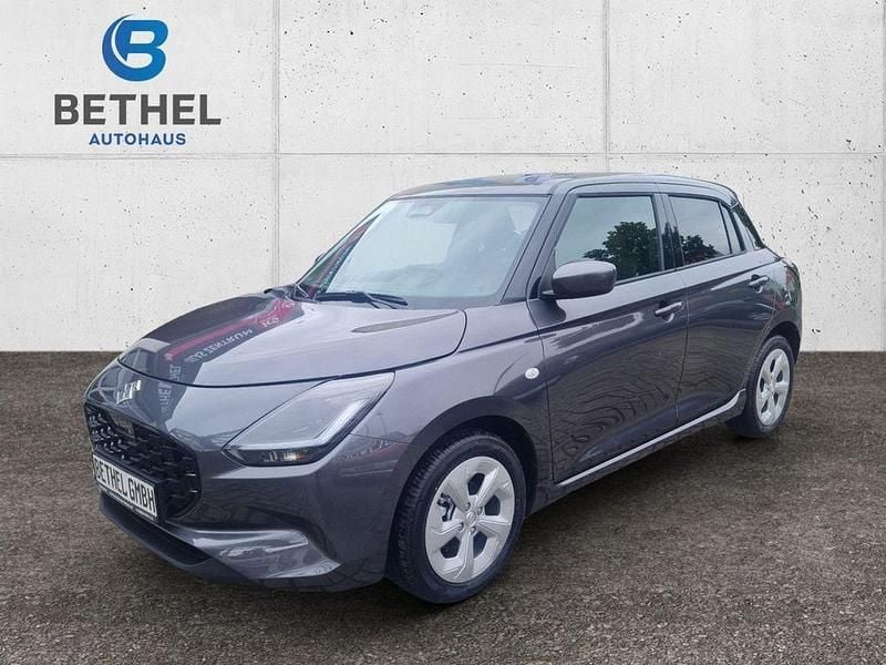 Grau Gebraucht 2024 Suzuki Swift Comfort Limousine | 17.990 € (Fairer Preis) - Bild 1/4