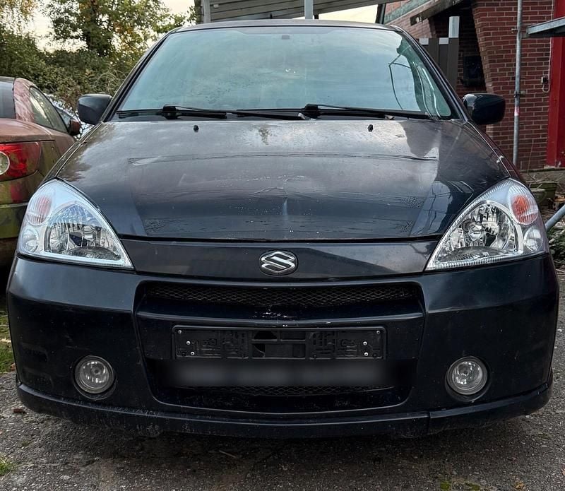 Schwarz Gebraucht 2003 Suzuki Liana Kleinwagen | 1.800 € - Bild 1/4