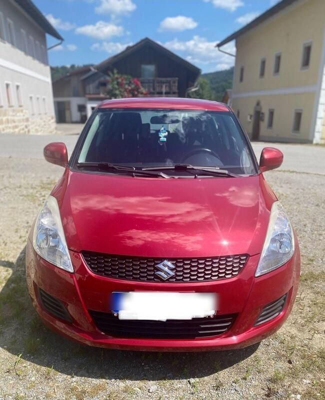 Rot Gebraucht 2012 Suzuki Swift Kleinwagen | 4.700 € (Fairer Preis) - Bild 1/4
